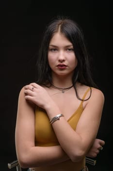 Studio portrait of a young beautiful girl with long hair 1