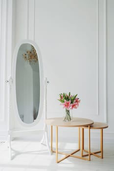 Classic interior of living room with table and mirror