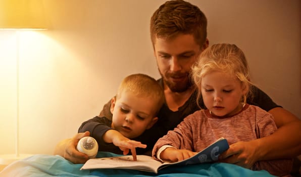 Night, kids or dad reading book in bed for learning, education or storytelling in a home for care. Family, relax or father with children siblings for a fantasy with a girl, boy or support for love.