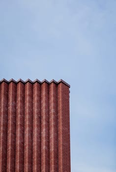 element of old brick building against the sky