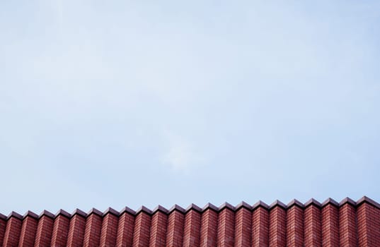 red brick office building over sky background. space for text