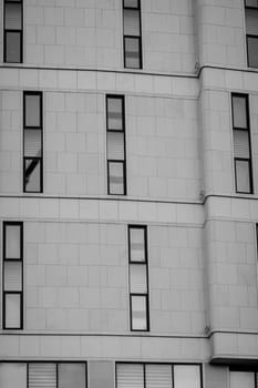 Office building in monochrome. Many windows on bank