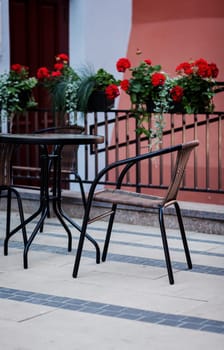 Empty street cafe table and chair. Lounge zone