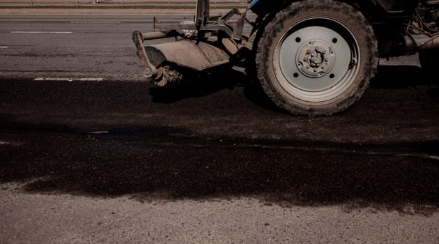 Street cleaning and washing. The municipal service is cleaning up the city.