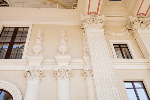 old European architecture with stucco and carved columns