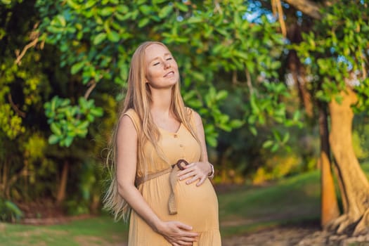 pregnant woman finds joy and serenity, relishing a tranquil moment outdoors during her pregnancy journey.