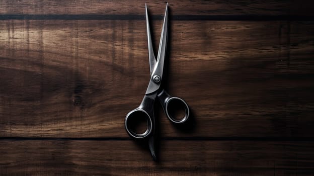 Old rustic vintage scissors on wooden background. barber shop concept