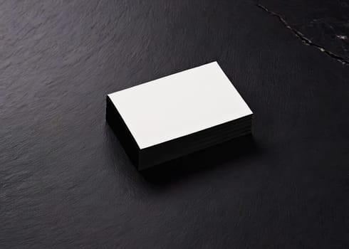 Blank white business cards on black background. Mockup for branding identity. 