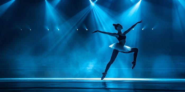 Theatrical performance. Beautiful, tender, graceful ballerina dancing against dark blue background with spotlight. Concept of art, classical ballet, creativity, choreography, beauty, ad. High quality photo
