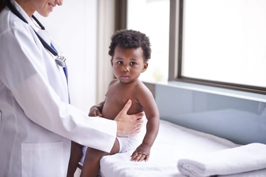 Baby, pediatrician and healthcare wellness or consultation as childhood development checkup, examination or ill. Patient, kid and medic support on hospital bed in Kenya for diagnosis, flu or clinic.
