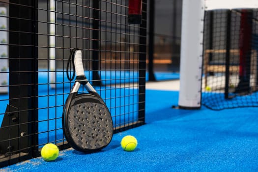 paddle sport on the paddle court, ball, rackets. High quality photo