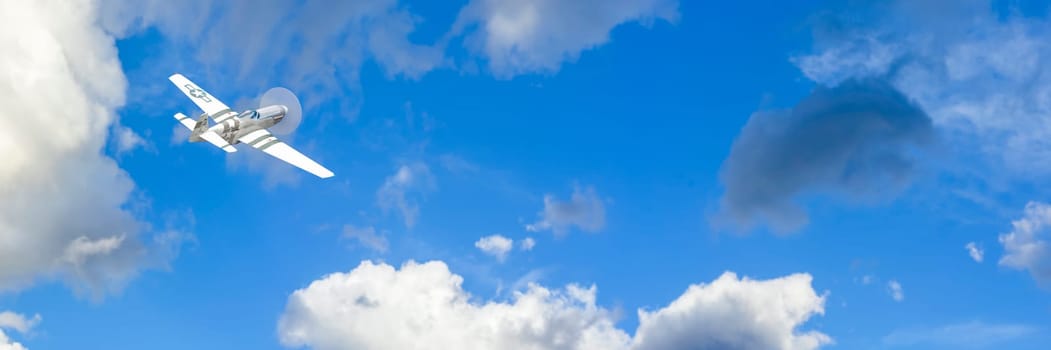 A solitary propeller airplane captured mid-flight with its distinct markings, cruising through a bright sky peppered with clouds.