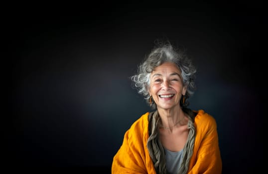 Portrait of Charming Senior Aged Female Retiree With Gray Hair, Wrinkles in Orange Cardigan on Dark Black Gray Background Smiling with Teeth Older Woman. Happy Pensioner, Retirement. AI Generated.