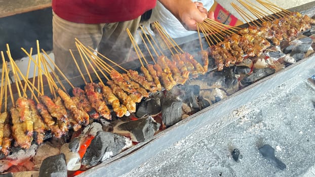 very flavorful beef satay meat grilled over charcoal, beef skewer delicious barbeque, sate sapi