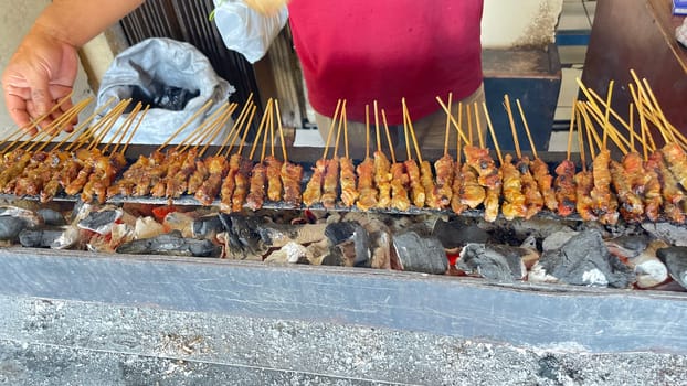 very flavorful beef satay meat grilled over charcoal, beef skewer delicious barbeque, sate sapi