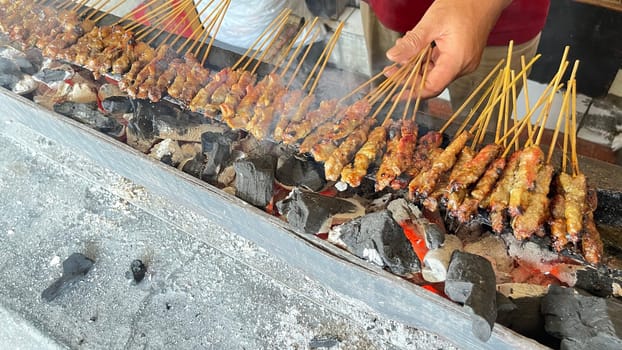 very flavorful beef satay meat grilled over charcoal, beef skewer delicious barbeque, sate sapi