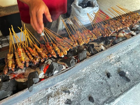 very flavorful beef satay meat grilled over charcoal, beef skewer delicious barbeque, sate sapi
