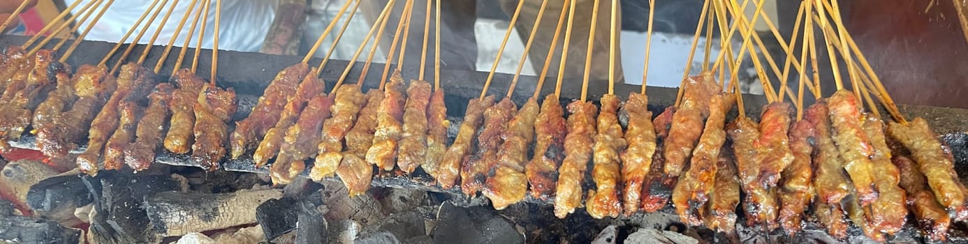 very flavorful beef satay meat grilled over charcoal, beef skewer delicious barbeque, sate sapi