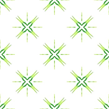 Textile ready unusual print, swimwear fabric, wallpaper, wrapping. Green charming boho chic summer design. Watercolor ikat repeating tile border. Ikat repeating swimwear design.