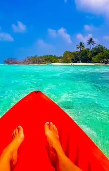 Canoe tour kayaking boat in the tropical island nature on Rasdhoo island in Rasdhoo Atoll Maldives.