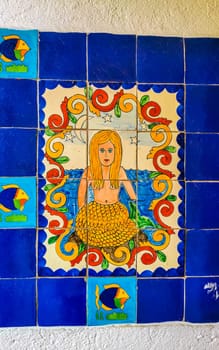 Beautiful colorful tiles with pictures in Zicatela Puerto Escondido Oaxaca Mexico.