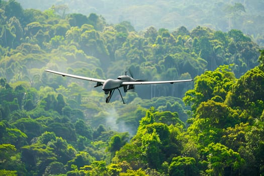 Military airplane flies over a dense green forest.