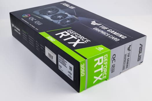 cardboard box of NVIDIA RTX 3060 OC 12g TUF gaming graphics card on white background. Tula, Russia - July 26, 2022