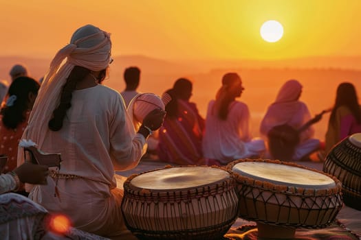 Musicians sit amidst a Holi celebration, their folk instruments harmonizing with the sunset. The scene is set against a field, evoking a deep connection to the land