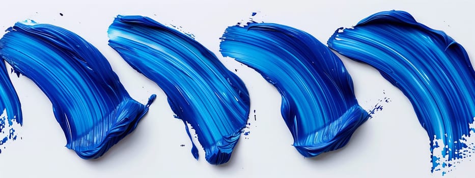 A closeup view of an electric blue brush stroke resembling a petal on a white canvas, showcasing the artful gesture on human body or head, evoking an aura of azure font and aqua vibes