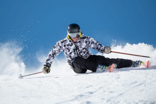 Expert skier on the slopes of Grandvalira in Andorra in Winter 2024.