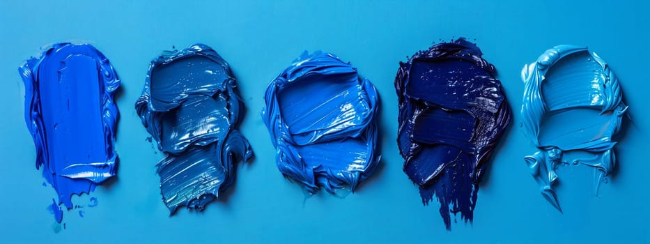 A row of various shades of azure, electric blue, and symmetrical paintings on a blue background. The perfect fashion accessory for any art event