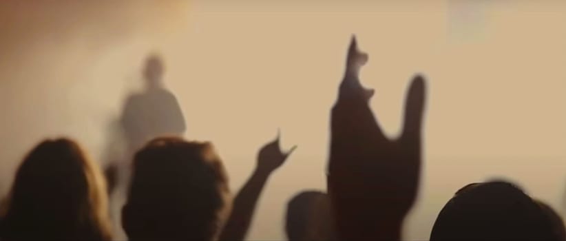 Blurry background picture of hand reaching out for God's help, good for your multimedia content background or card design