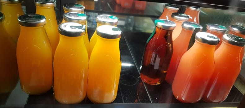 Surakarta, Central Java, Indonesia, 02 August 2022, Starbucks Orange Juice, mix fruit juice and apple juice inside the display fridge