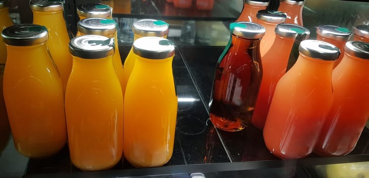 Surakarta, Central Java, Indonesia, 02 August 2022, Starbucks Orange Juice, mix fruit juice and apple juice inside the display fridge