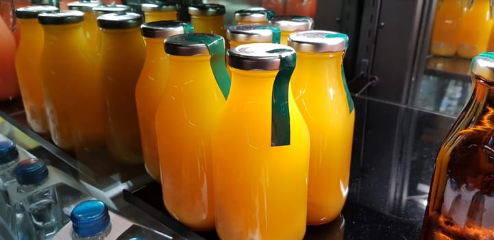 Surakarta, Central Java, Indonesia, 02 August 2022, Starbucks Orange Juice, mix fruit juice and apple juice inside the display fridge