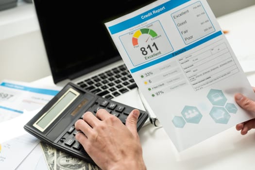 The man checks the credit report and how many credit points. High quality photo