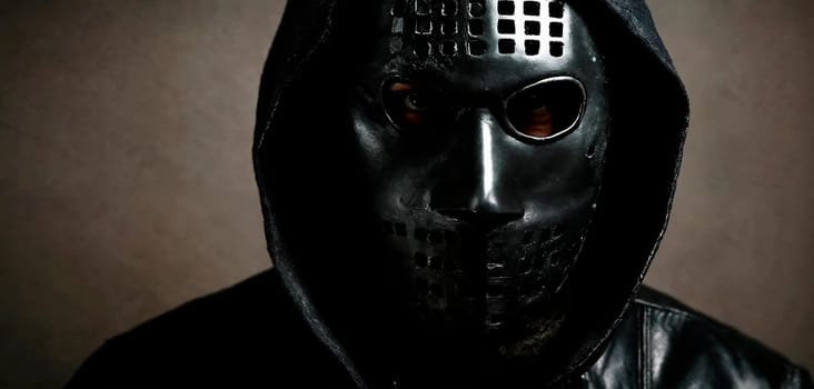 Criminal in a black mask. Close-up. Generative AI. High quality photo