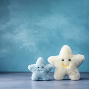 Two plush star-shaped toys with happy faces on a blue background.