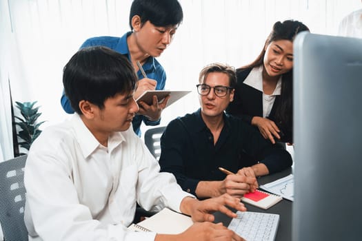 Group of diverse office worker employee working together on strategic business marketing planning in corporate office room. Positive teamwork in business workplace concept. Prudent