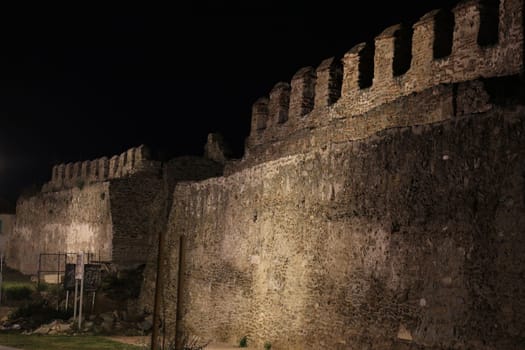 Journey through time and immerse yourself in the mystical allure of Thessaloniki's ancient city walls under the cloak of night