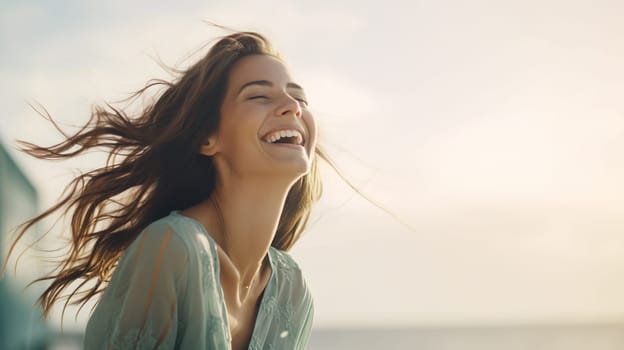 A happy young woman is captured in a moment of laughter, with her hair blowing in the sea breeze during a beautiful sunset - Generative AI