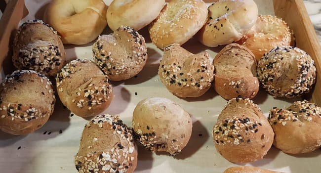 Fresh Baked soft bread rolls and hard bread rolls. Warm Fresh Buttery Rolls. good for your multimedia content background and restaurant menu