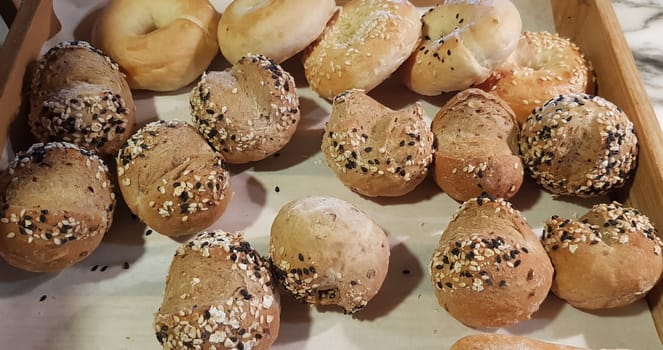 Fresh Baked soft bread rolls and hard bread rolls. Warm Fresh Buttery Rolls. good for your multimedia content background and restaurant menu