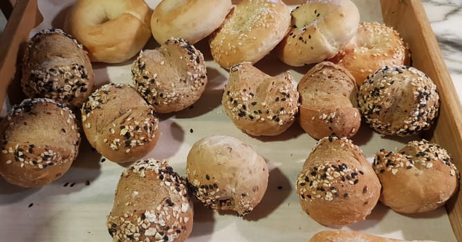 Fresh Baked soft bread rolls and hard bread rolls. Warm Fresh Buttery Rolls. good for your multimedia content background and restaurant menu