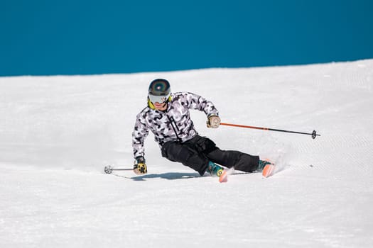 Expert skier on the slopes of Grandvalira in Andorra in Winter 2024.