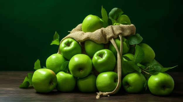 Bag made of natural fabric with green apples. The concept of recycling, saving, no plastic, proper nutrition, healthy lifestyle, diet, veganism, vegetarianism.