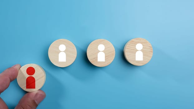 Human Resource Management, Business hiring and recruitment selection, Human Resource Management. Focus human icon on circular wooden board, Choice of employee leader crowd, leadership concept.