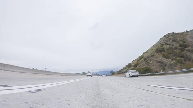 Cruising on California's HWY 134 near Pasadena amid a cloudy winter day.