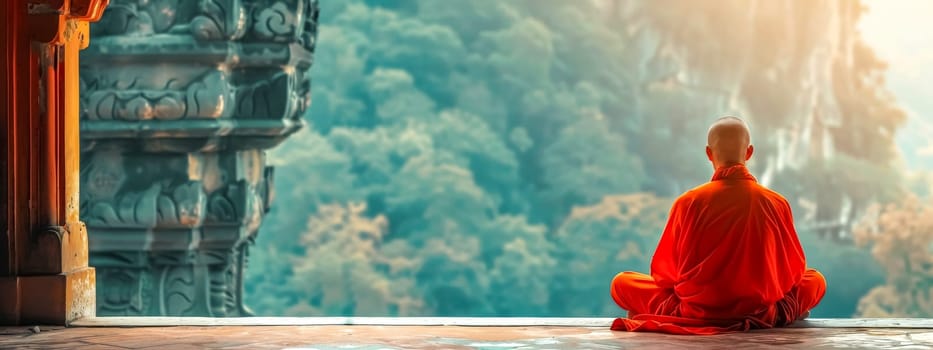 Monk in orange robes meditates peacefully with a scenic forest backdrop at dawn