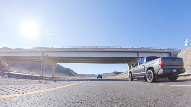 HWY 15, California, USA-December 3, 2022-Embarking on a road trip from Nevada to California, driving on Highway 15 during the day offers scenic views and an exciting journey between states.